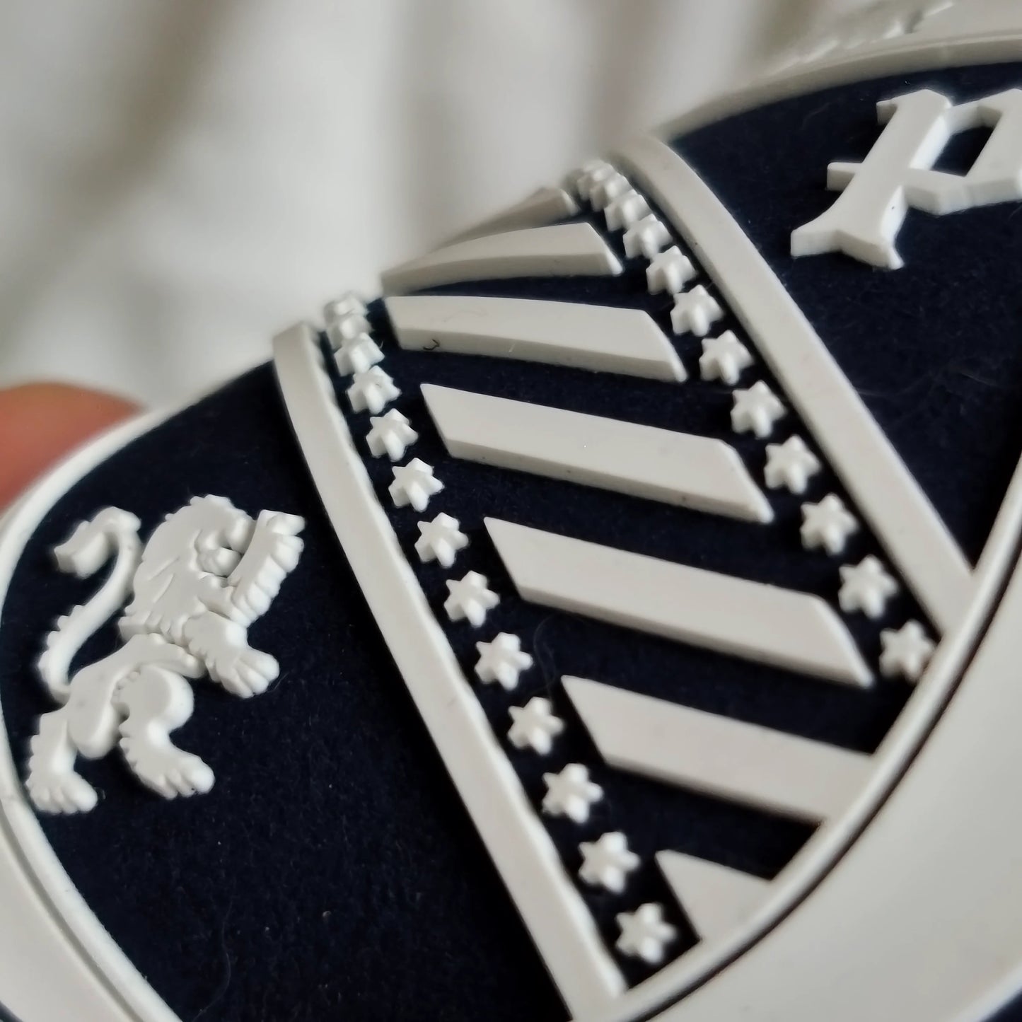 Custom 3D TPU logo on a soft fabric badge