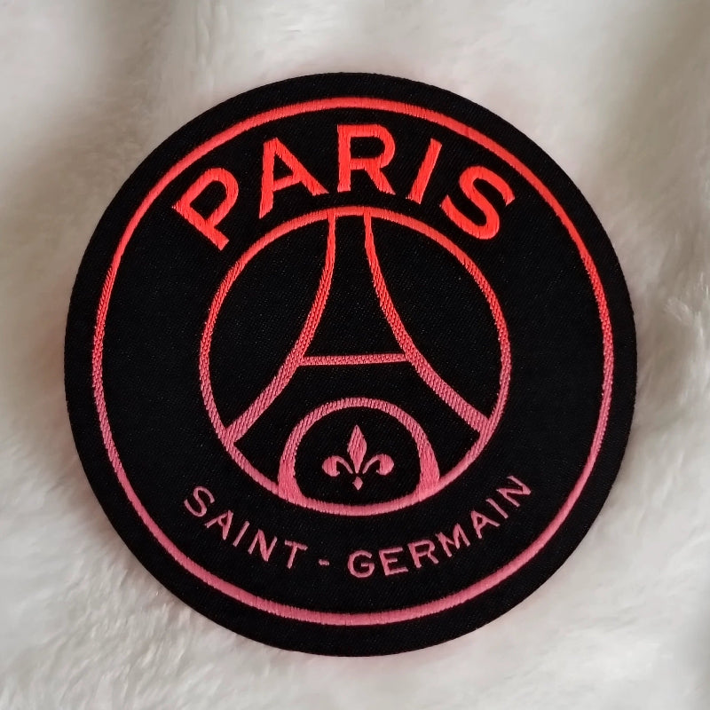 Custom woven patch with heat transfer iron-on backing
