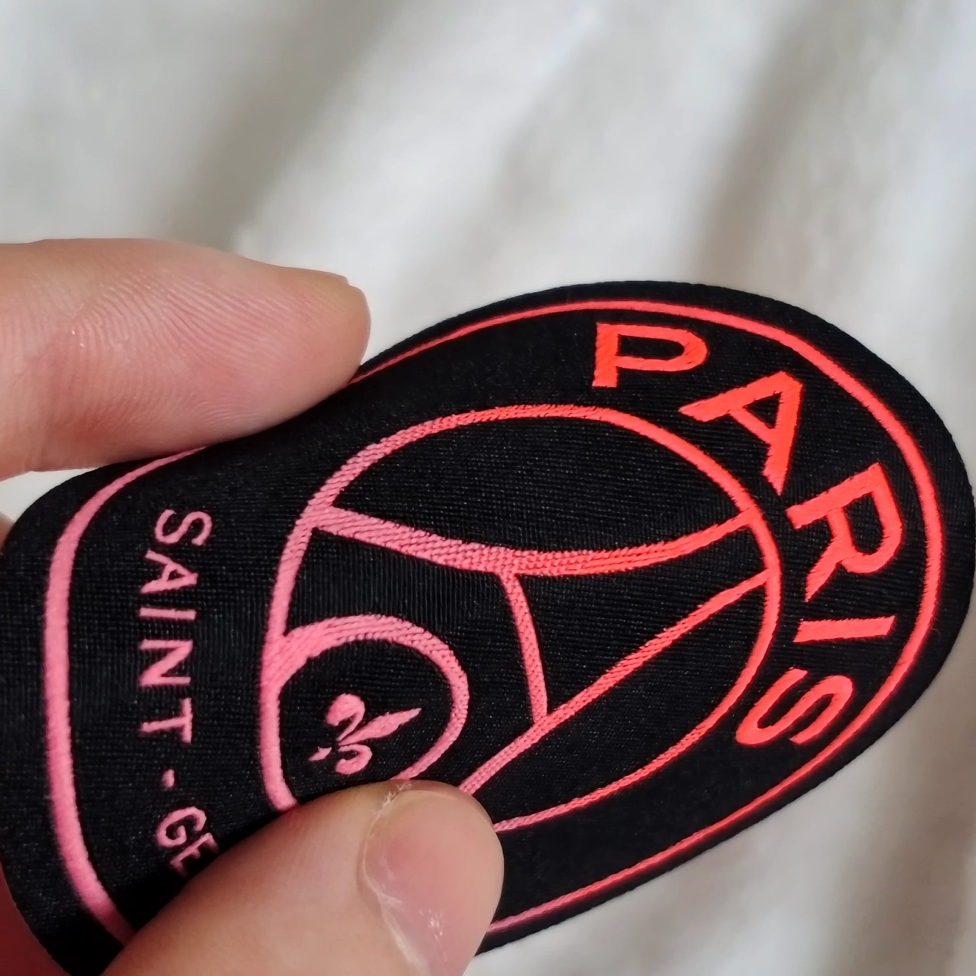 Custom woven patch with heat transfer iron-on backing