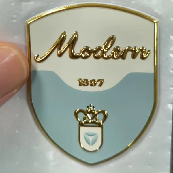 Gold and silver shiny TPU badges